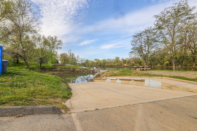 view of property's community featuring a water view