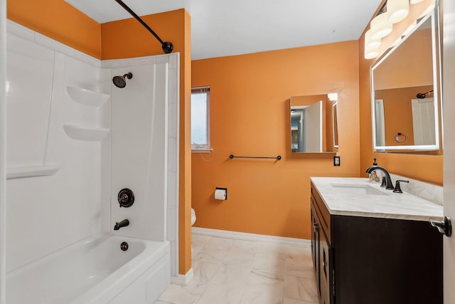 full bath with toilet, bathtub / shower combination, baseboards, marble finish floor, and vanity