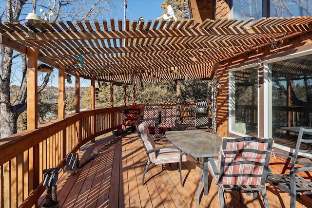 wooden terrace with a pergola