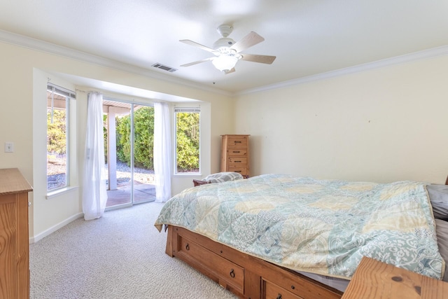 carpeted bedroom with ceiling fan, ornamental molding, and access to exterior