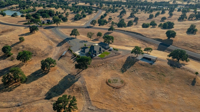 aerial view with a water view and a rural view