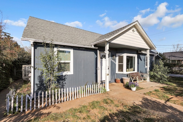 bungalow-style house with a patio