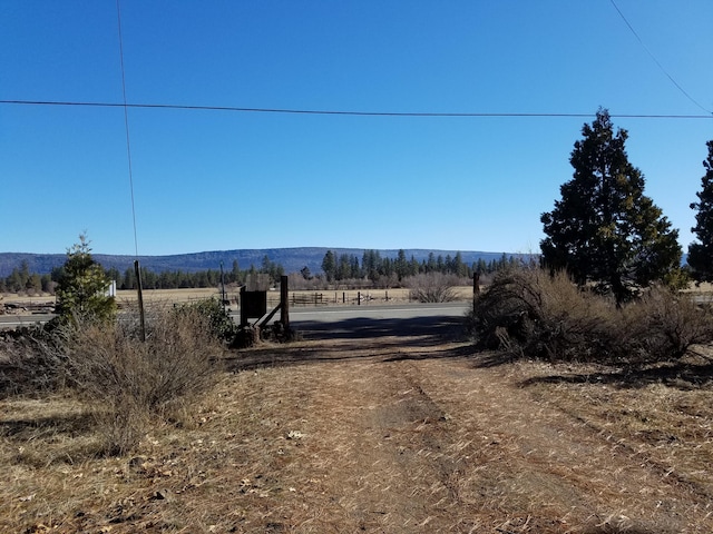 view of street featuring a mountain view and a rural view