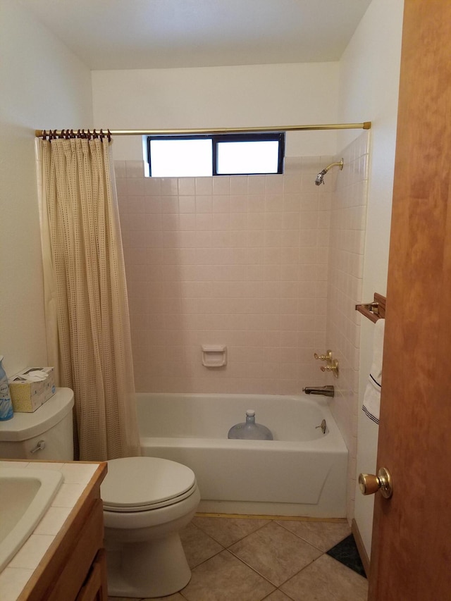 bathroom with toilet, shower / bathtub combination with curtain, vanity, and tile patterned floors