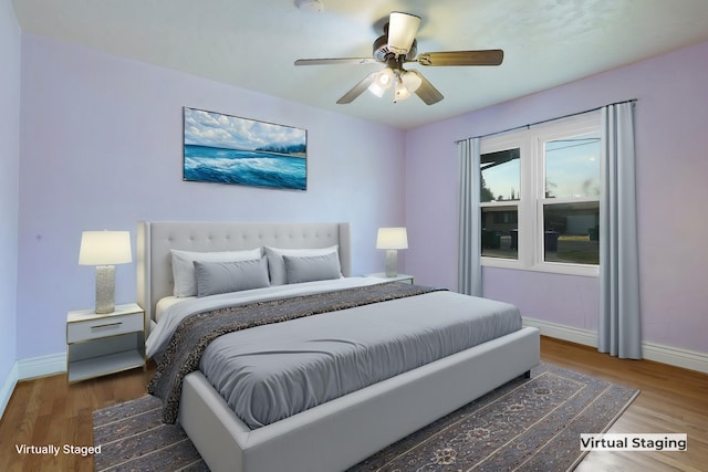 bedroom featuring ceiling fan and hardwood / wood-style floors