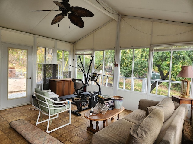 sunroom featuring plenty of natural light, lofted ceiling with beams, and ceiling fan