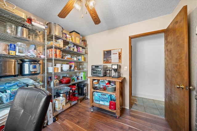 storage room featuring ceiling fan