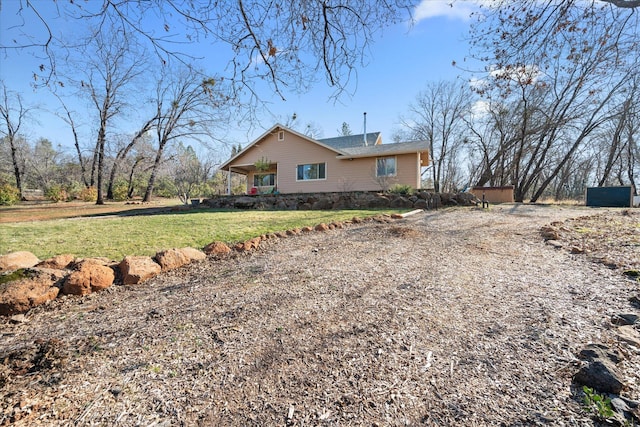 exterior space with a yard