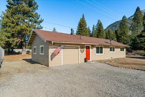 ranch-style home with a garage