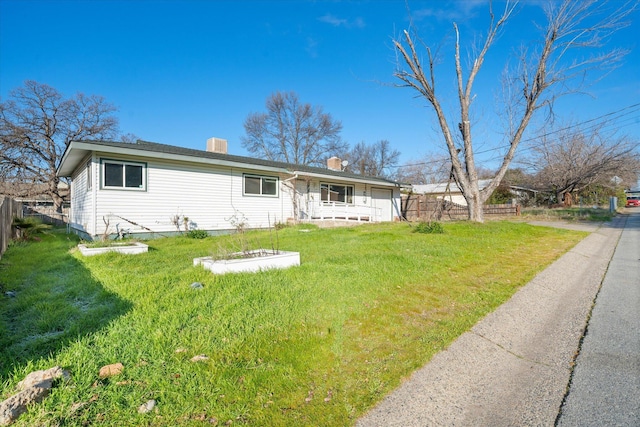 view of front facade with a front lawn