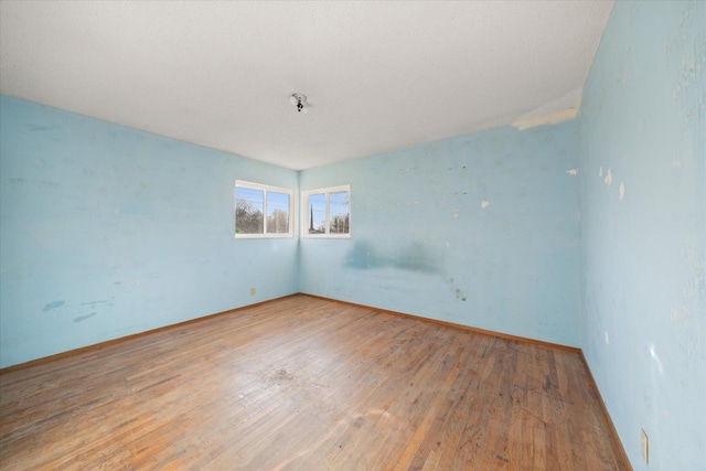 empty room featuring hardwood / wood-style floors