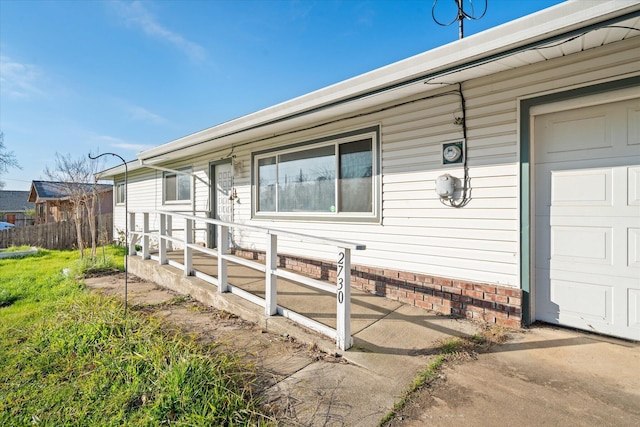 exterior space with a garage