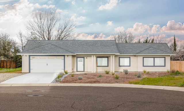 single story home with a garage