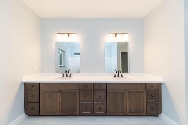 bathroom featuring vanity and walk in shower