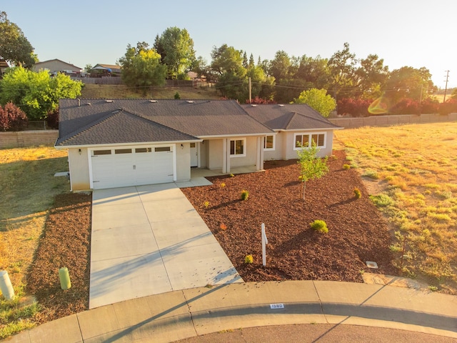 single story home with a garage