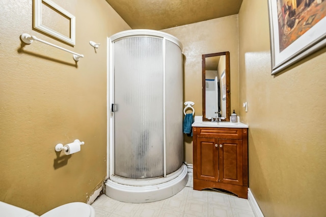 bathroom with vanity and walk in shower