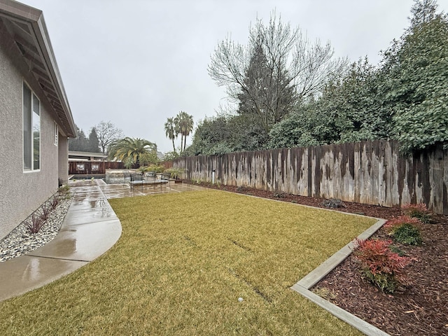 view of yard with a patio area