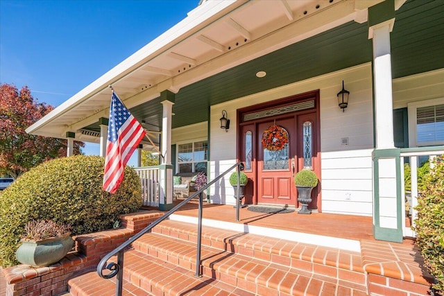 doorway to property with covered porch