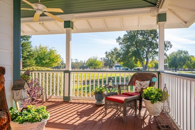 wooden deck with ceiling fan