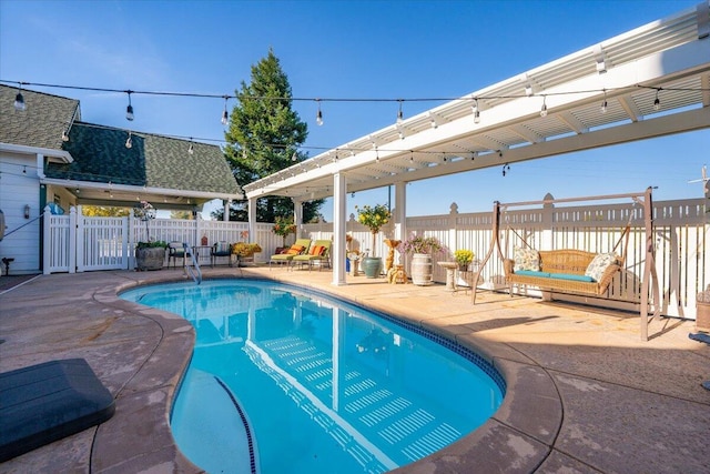 view of swimming pool featuring a patio area