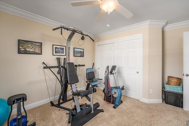 exercise area with crown molding, light carpet, and ceiling fan