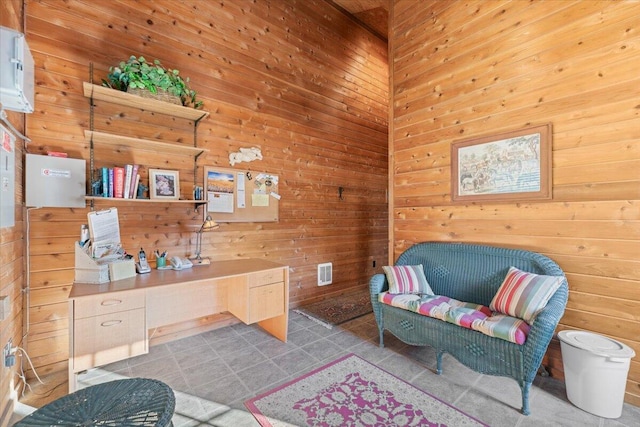 sitting room with wooden walls