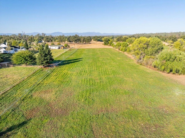 bird's eye view with a mountain view and a rural view