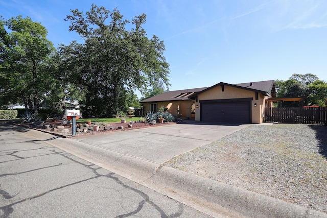 ranch-style home with a garage