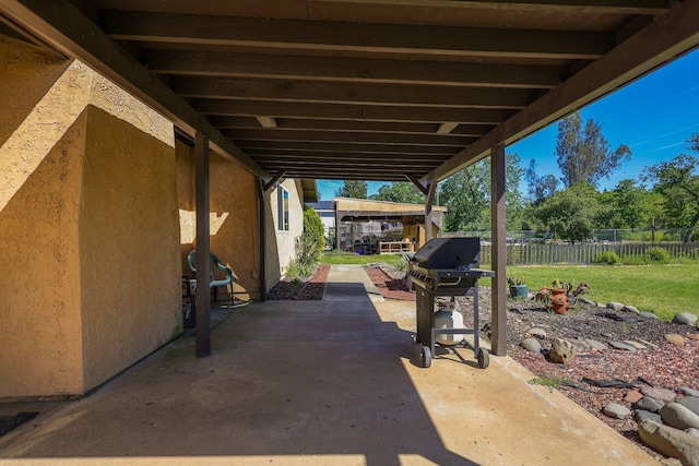 view of patio featuring a grill