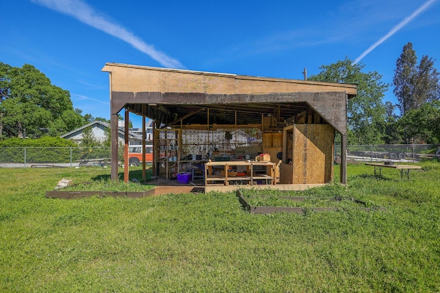 view of outdoor structure with a yard