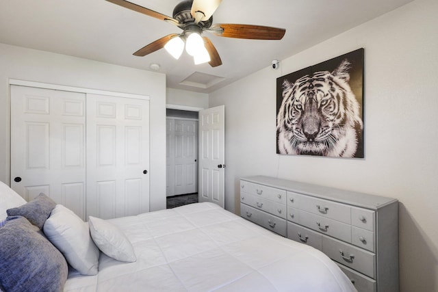 bedroom featuring ceiling fan and a closet