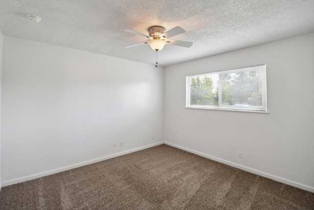 2548 Saturn, Redding, CA 96002 - empty room with carpet flooring, a ceiling fan, a textured ceiling, baseboards, and a smoke detector