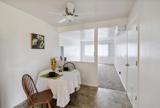 2548 Saturn, Redding, CA 96002 - dining space featuring an AC wall unit, ceiling fan, and baseboards