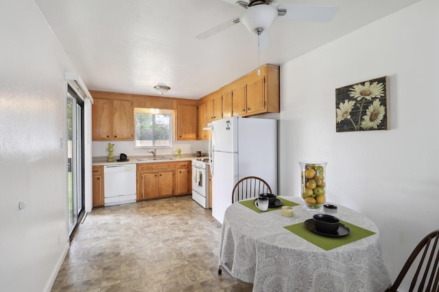 2548 Saturn, Redding, CA 96002 - kitchen with white appliances, a sink, stone finish floors, light countertops, and a ceiling fan