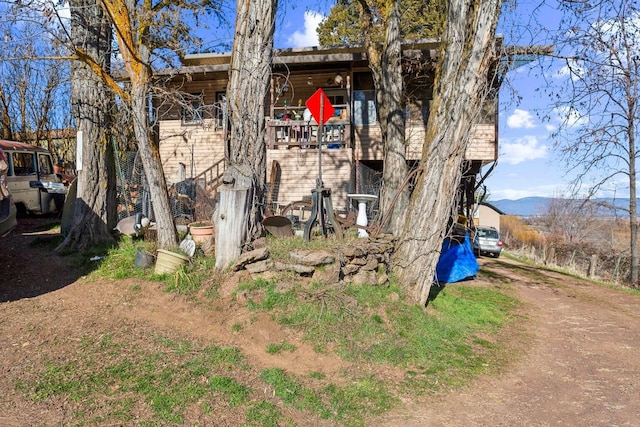 view of home's exterior with a mountain view