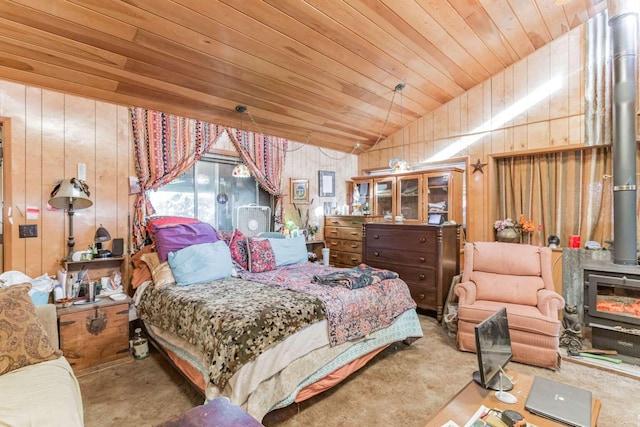 bedroom featuring lofted ceiling, wooden walls, wooden ceiling, and a wood stove