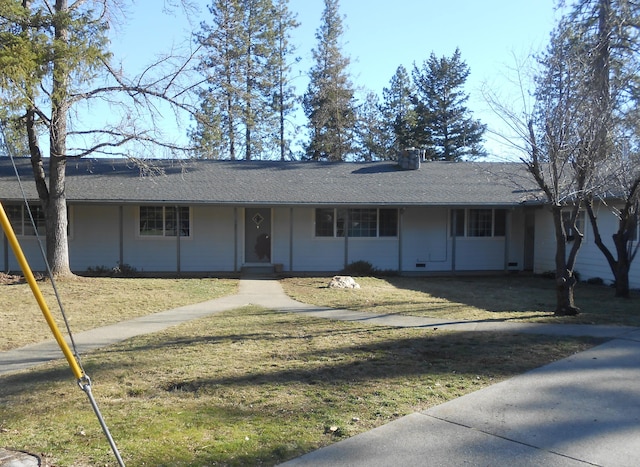 single story home with a front yard