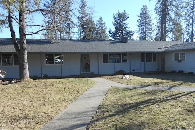 single story home featuring a front yard