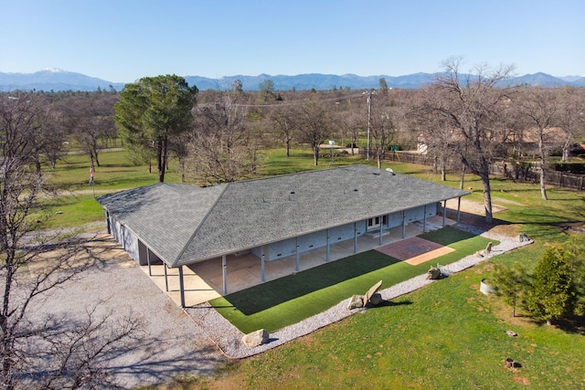 drone / aerial view featuring a mountain view