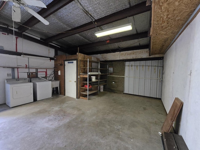 garage featuring washing machine and dryer