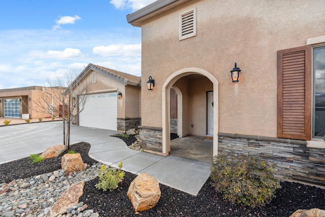 entrance to property featuring a garage