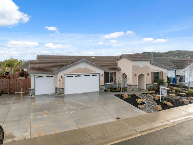 view of front of property with a garage