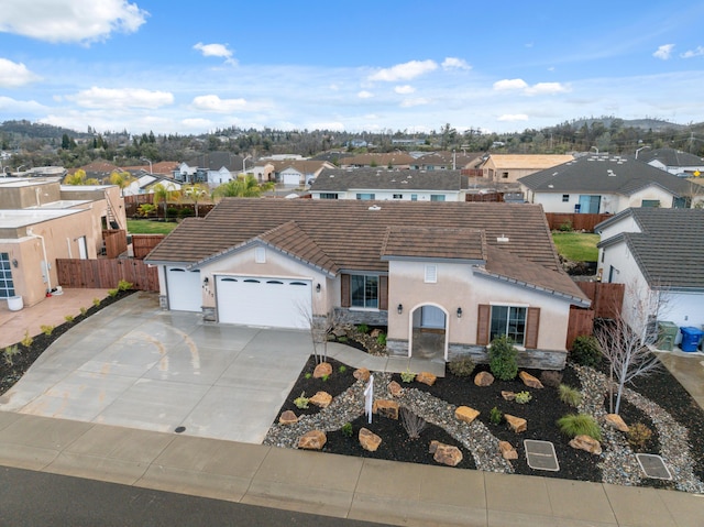 view of front of home with a garage