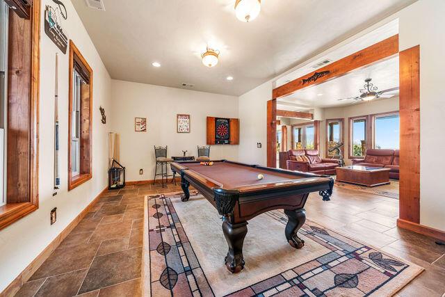 playroom with ceiling fan and billiards