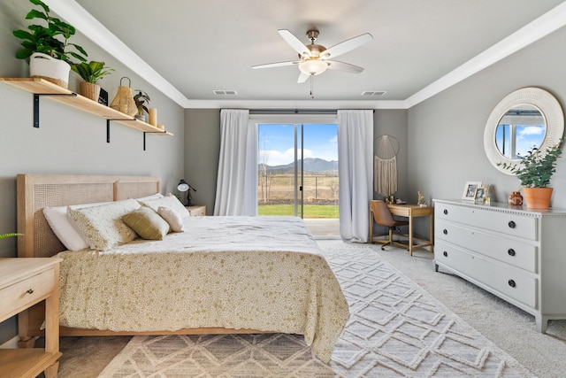 bedroom featuring ornamental molding, light carpet, access to outside, and ceiling fan