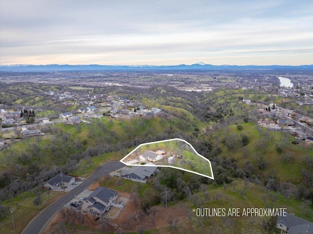 aerial view at dusk with a mountain view