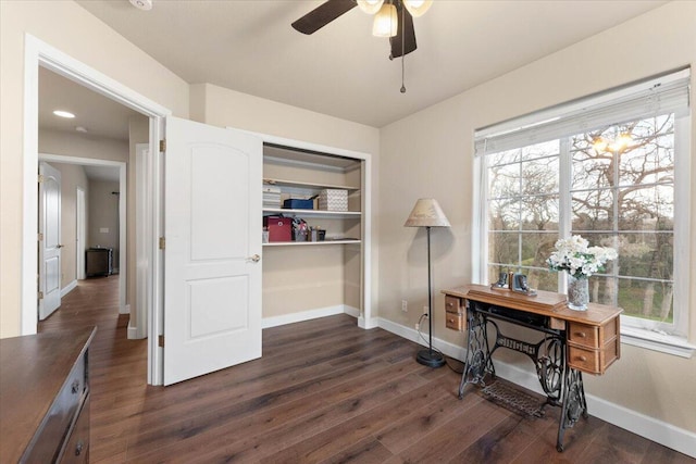 home office featuring ceiling fan and dark hardwood / wood-style floors