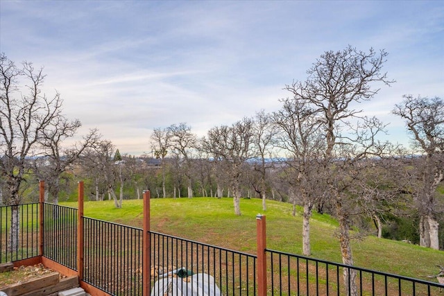 deck featuring a lawn