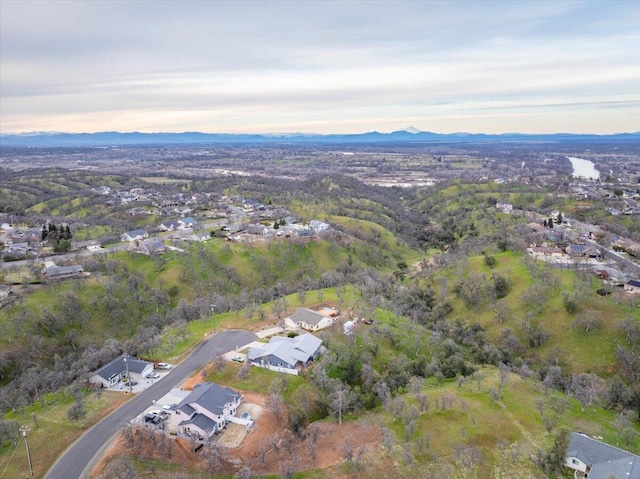 aerial view at dusk with a mountain view