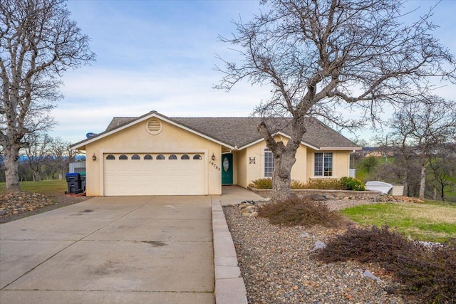 single story home featuring a garage